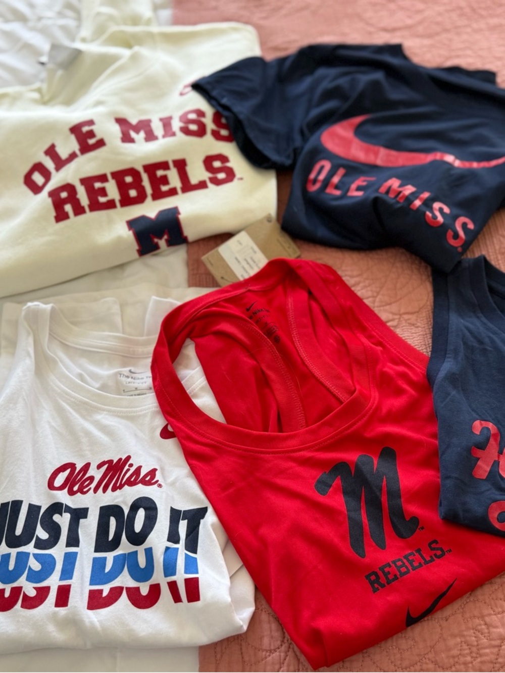 NIKE garments 8 different garments 2 bottoms 6 tops Ole Miss size Medium